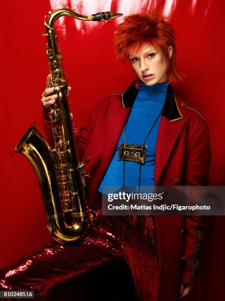 Model Alice Cornish poses as David Bowie at a fashion shoot for Madame Figaro on May 10, 2017 in Paris, France. Coat , top , pants , necklace ....