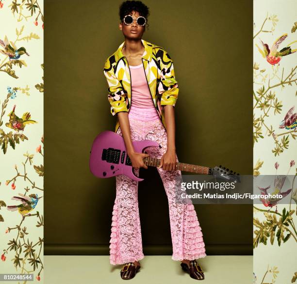 Model Danyrose Langeron poses as Prince at a fashion shoot for Madame Figaro on May 10, 2017 in Paris, France. Jacket , tank top and pants ,...