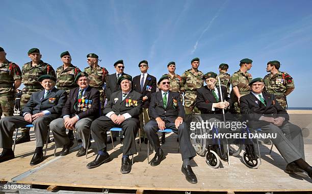 Members of the Kieffers commando, Hubert Faure, Yves Meudal, Rene Rossey, Jean Morel, Maurice Chauvet and Leon Gautier attend a ceremony,...