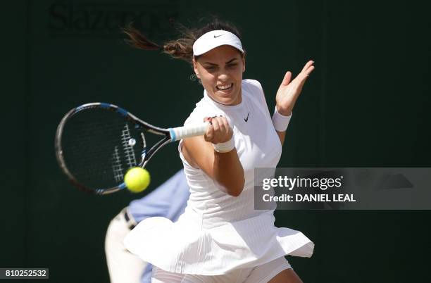 Croatia's Ana Konjuh returns against Slovakia's Dominika Cibulkova during their women's singles third round match on the fifth day of the 2017...