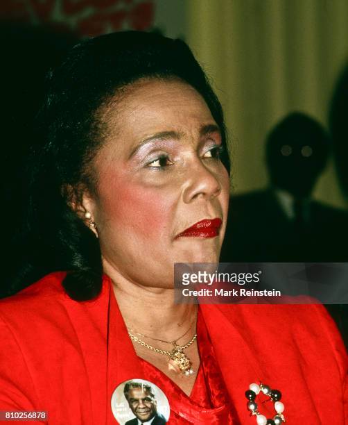 Close-up of American Civil Rights leader Coretta Scott King as she attends an unspecified event, Chicago, Illinois, 1987. She wears a campaign button...
