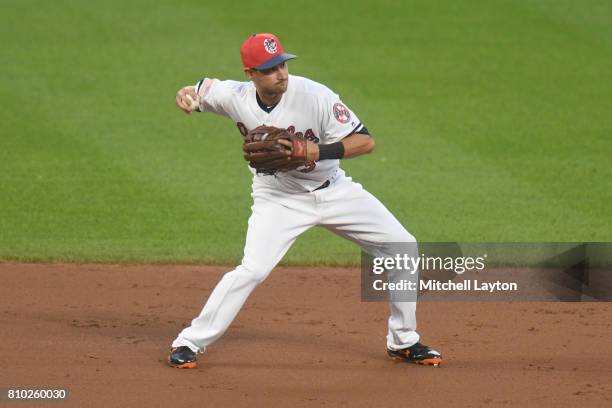 Paul Janish of the Baltimore Orioles fields a ground ball during a baseball game against the Tampa Bay Rays at Oriole Park at Camden Yards on July 1,...