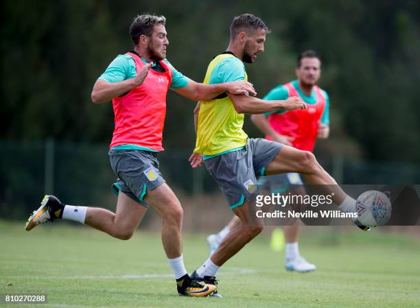 Conor Hourihane of Aston Villa in action with team mate Jordan Veretout during a Aston Villa training session at the club's training camp at Faro on...
