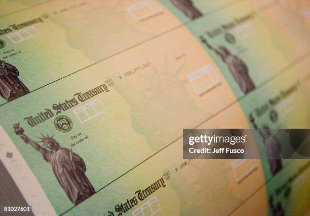 Economic stimulus checks are prepared for printing at the Philadelphia Financial Center May 8, 2008 in Philadelphia, Pennsylvania. One hundred and...