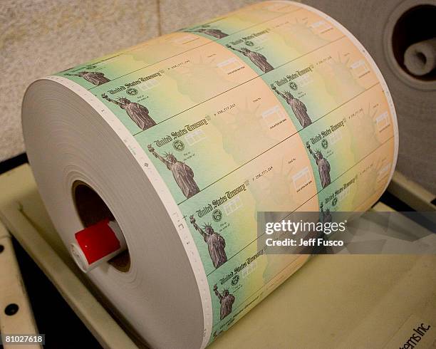 Economic stimulus checks are prepared for printing at the Philadelphia Financial Center May 8, 2008 in Philadelphia, Pennsylvania. One hundred and...