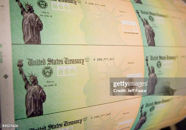 Economic stimulus checks are prepared for printing at the Philadelphia Financial Center May 8, 2008 in Philadelphia, Pennsylvania. One hundred and...