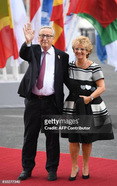 President of the European Commission Jean-Claude Juncker and his wife Christiane Frising arrive for a concert at the Elbphilharmonie concert hall...