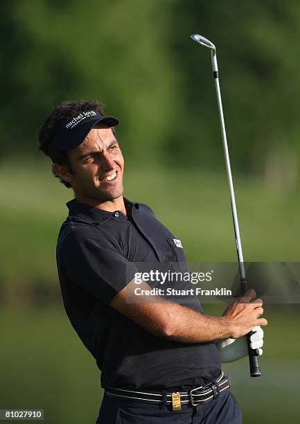 Edoardo Molinari of Italy plays his approach shot on the 18th hole during the first round of the MC Methorios Capital Italian Open Golf at The...