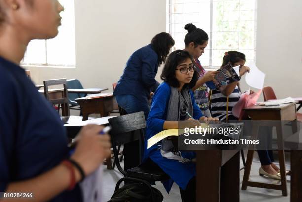 Students complete admission procedure at Daulat Ram College, on July 7, 2017 in New Delhi, India. Delhi University Colleges came out with their third...