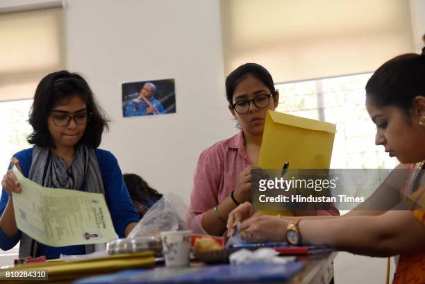 Students complete admission procedure at Daulat Ram College, on July 7, 2017 in New Delhi, India. Delhi University Colleges came out with their third...