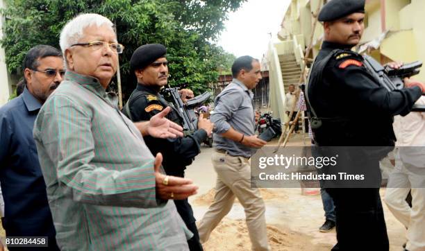 President Lalu Prasad Yadav coming out from court after appearing before a special CBI court in connection of a Fodder Scam case at Court premises,...