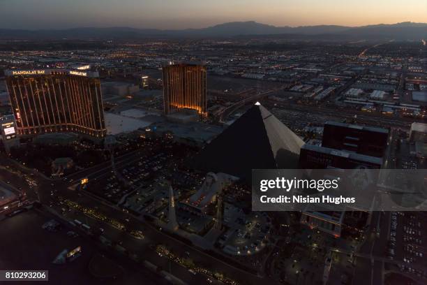 aerial photo of the las vegas strip lights, sunset - mandalay bay resort & casino stock pictures, royalty-free photos & images