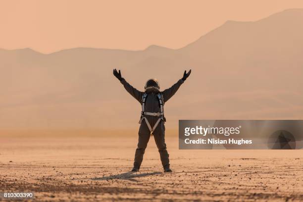 astronaut standing on mars - space program stock pictures, royalty-free photos & images