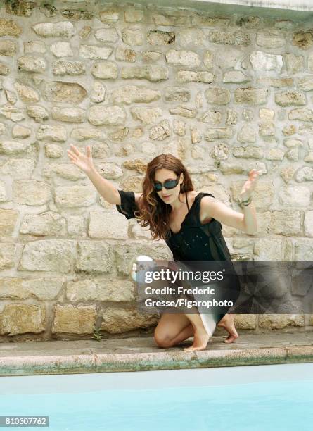 Singer Zazie is photographed for Madame Figaro on May 21, 2007 in Antibes, France. Dress , swimsuit , sunglasses . PUBLISHED IMAGE. CREDIT MUST READ:...