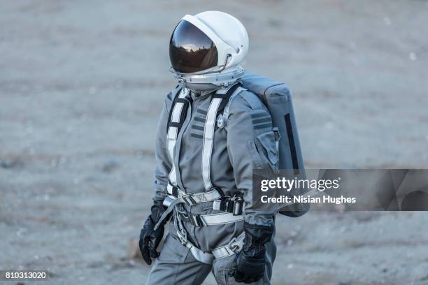 portrait of astronaut in space suit - space helmet stock pictures, royalty-free photos & images