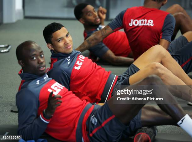 Modou Barrow, Jefferson Montero and Leroy Fer work out in the gym during the Swansea City Training at The Fairwood Training Ground on July 5, 2017 in...