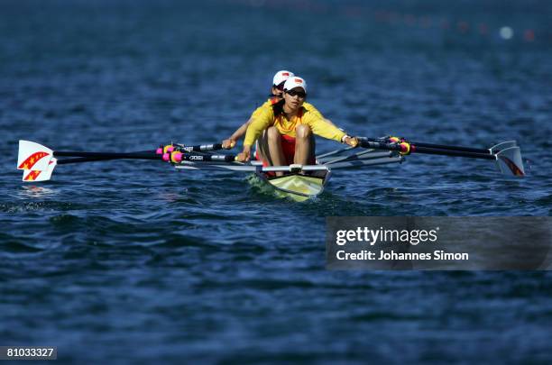 Haixia Chen and Dongxiang Xu of China compete in the lightweight women's doubles sculls heat 4 during day 1 of the FISA Rowing World Cup at the...