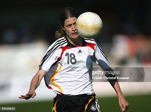 Kerstin Garefrekes of Germany runs with the ball during the Womens Euro 2009 qualifier match between Belgium and Germany at the KAS-Stadium on May 7,...