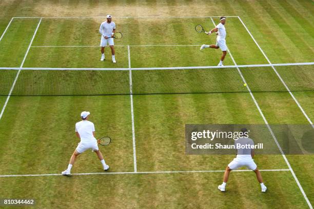 Jamie Murray of Great Britain and Bruno Soares of Brazil and Sam Groth of Australia and Robert Lindstedt of Sweden in action during their Gentlemen's...