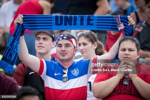 Fan of the U.S. Men's National Team holds up a scarf that says UNITE during the International Friendly Match between U.S, Men's National Team and...