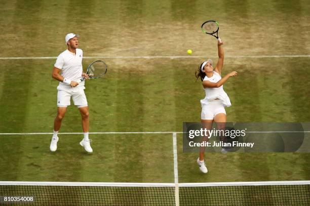 Laura Robson of Great Britain and Dominic Inglot of Great Britain in action during the Mixed Doubles first round match against Andre Begemann of...