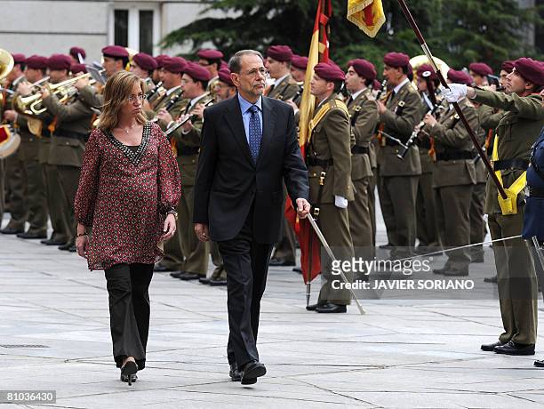 Spain's Defense Minister Carme Chacon and High Representative for the Common Foreign and Security Policy, Javier Solana review the troops before a...