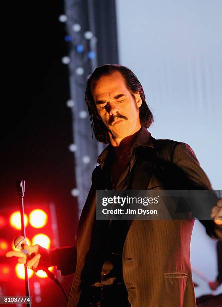 Australian musician Nick Cave performs with his band the Bad Seeds at the Hammersmith Apollo on May 8, 2008 in London, England.