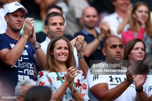 Davis Cup captain Leon Smith, Andy Murray's wife Kim Murray and physio Shane Annun applaud during the Gentlemen's Singles third round match between...