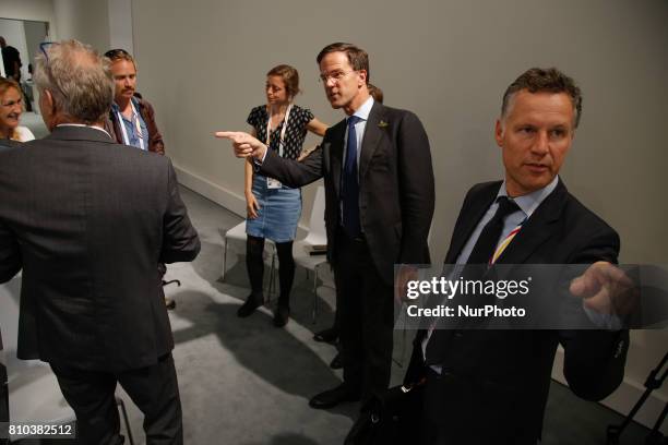 Dutch PM Mark Rutte is seen talking to journalists in an informal press conference during the G20 summit in Hamburg on 7 July, 2017.