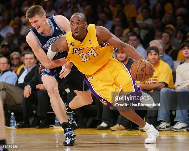 Kobe Bryant of the Los Angeles Lakers drives to the basket against Andrei Kirilenko of the Utah Jazz in Game Two of the Western Conference Semifinals...