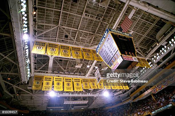 General view of scoreboard and Boston Bruins banners hanging from the ceiling at Boston Garden.