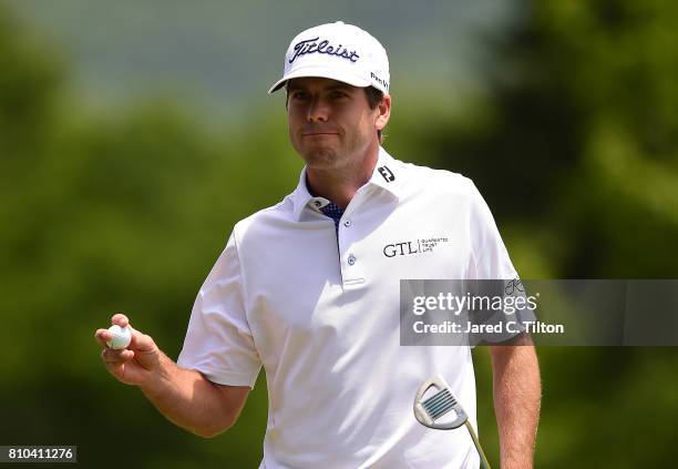 Ben Martin reacts after his par putt on the 15th green during round two of The Greenbrier Classic held at the Old White TPC on July 7, 2017 in White...