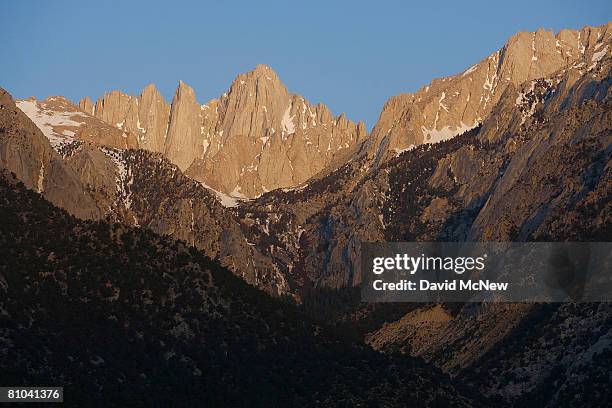 Mount Whitney, the tallest peak in the continental US at 14,494 feet, stands in the Sierra Nevada Mountains, which carry less snow than normal, on...