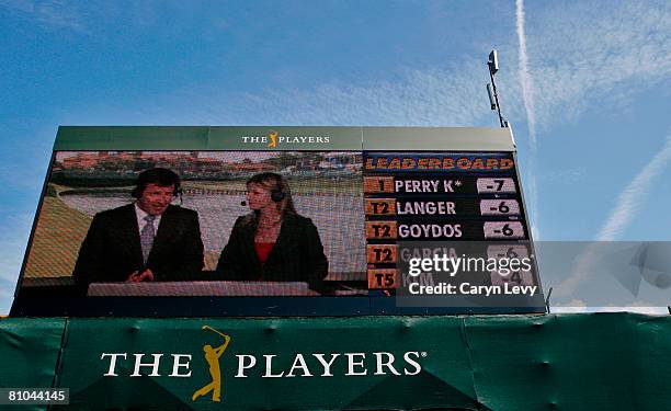 Nick Faldo and Kelly Tilghman appear live on the Mitsubishi electronic scoreboard during the second round of THE PLAYERS Championship on THE PLAYERS...