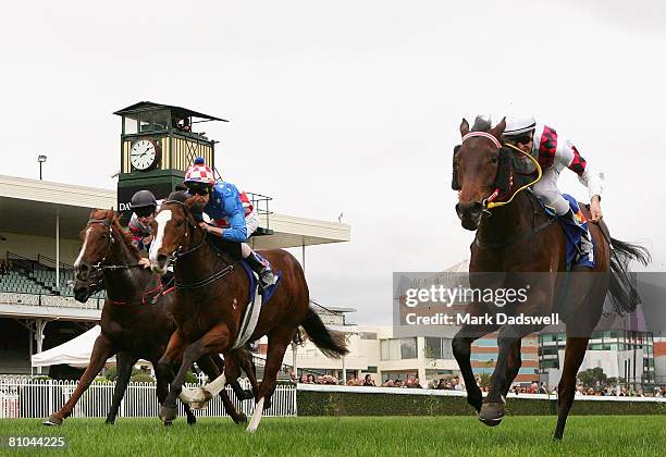 Gold In Dubai ridden by Michael Rodd narrowly wins Race Four the Bayside Chrysler Jeep & Didge Blue Sapphire Stakes during the Thoroughbred Club Cup...