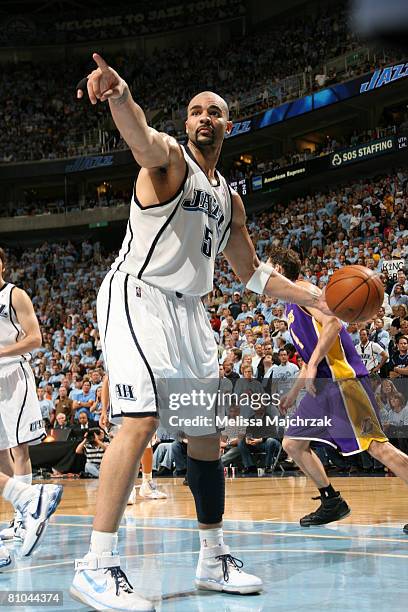 Carlos Boozer of the Utah Jazz calls a timeout in the matchup against the Los Angeles Lakers in Game Three of the Western Conference Semifinals...