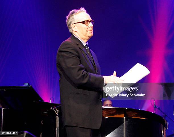 Composer and music conductor Howard Shore gathers his papers after conducting a score during the Berklee College of Music's Commencement Concert at...