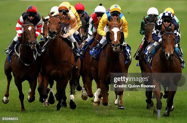 The field comes down the back straight in the BTB Australia Directional Drilling Plate during the Thoroughbred Club Cup Day meeting at Caulfield...