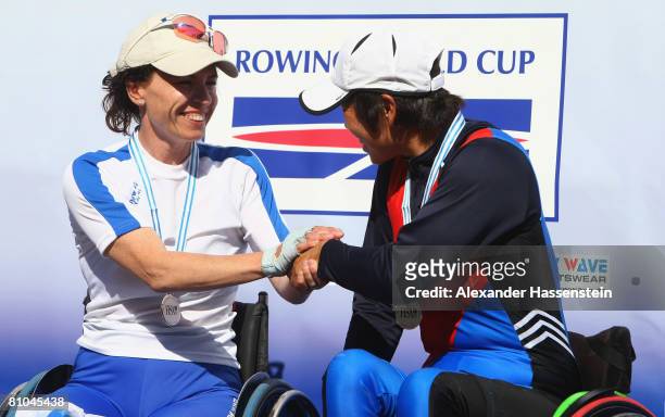 Jong Rye Lee of Korea wins and Pascale Bercovitch of Israel gets the second place at the Arms women's Single Sculls competition during day 3 of the...