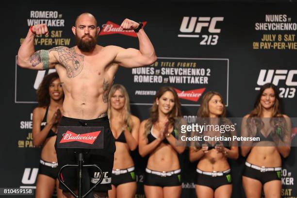 Travis Browne poses on the scale during the UFC weigh-in at the Park Theater on July 7, 2017 in Las Vegas, Nevada.