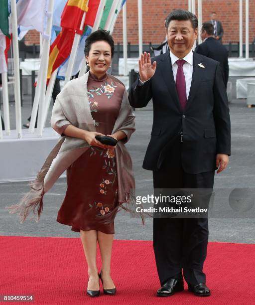 Chinese President Xi Jinping and his wife Peng Liyuan arrive to the Elbphilharmone for the dinner during the G20 Summit on July 2017 in Hamburg,...