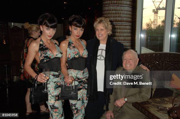 Lto R Gabriella Irimia and Monica Irimia of the Cheeky Girls with Jan Rooney and Mickey Rooney attend David Gest's dinner for Caudwell Childrens...