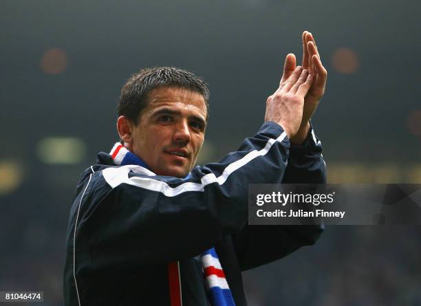 Nacho Novo of Rangers thanks supporters after The Clydesdale Bank Scottish Premier League match between Rangers and Dundee United at Ibrox Stadium on...