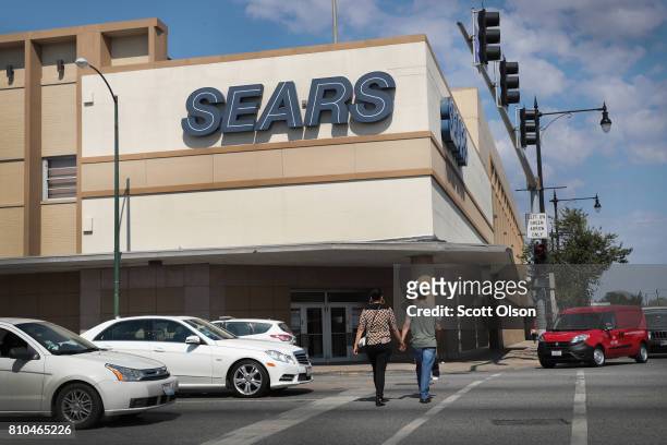 Sign hangs above the 60-year-old Sears store slated for closing in the Galewood neighborhood on July 7, 2017 in Chicago, Illinois. When the store...