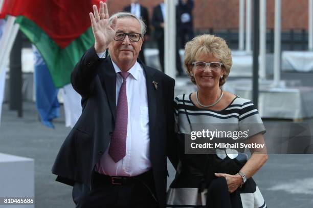 Commission President Jean-Claud Juncker and his wife Christiane Frising (R arrive to the Elbphilharmone for the dinner during the G20 Summit on July...
