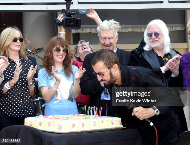 Barbara Bach, singer Jenny Lewis, director David Lynch, musician Ringo Starr and musician Edgar Winter appear at the "Peace & Love" birthday...