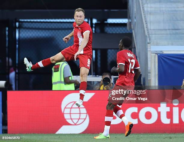 Scott Arfield of Canada celebrates after scoring the second goal during the Group A match between French Guiana and Canada as part of the Gold Cup...