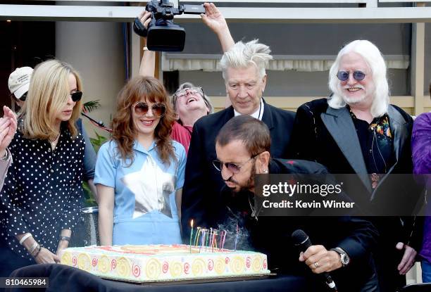 Barbara Bach, singer Jenny Lewis, director David Lynch, musician Ringo Starr and musician Edgar Winter appear at the "Peace & Love" birthday...