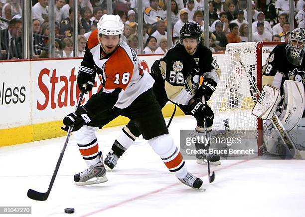 Kris Letang of the Pittsburgh Penguins chases Mike Richards of the Philadelphia Flyers during game one of the Eastern Conference Finals of the 2008...