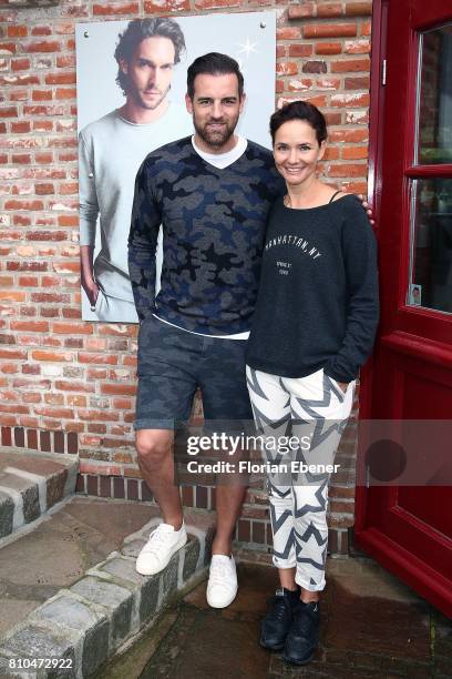 Christoph Metzelder and Judith Dommermuth attend the Different Fashion Event on July 7, 2017 in Sylt, Germany.